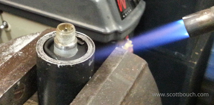 Aircraft percent rpm tachometer indicator: Using a blow-torch to melt the solder