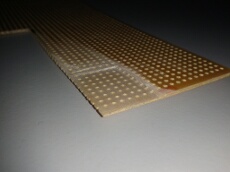 Veroboard / Stripboard filed down to half thickness